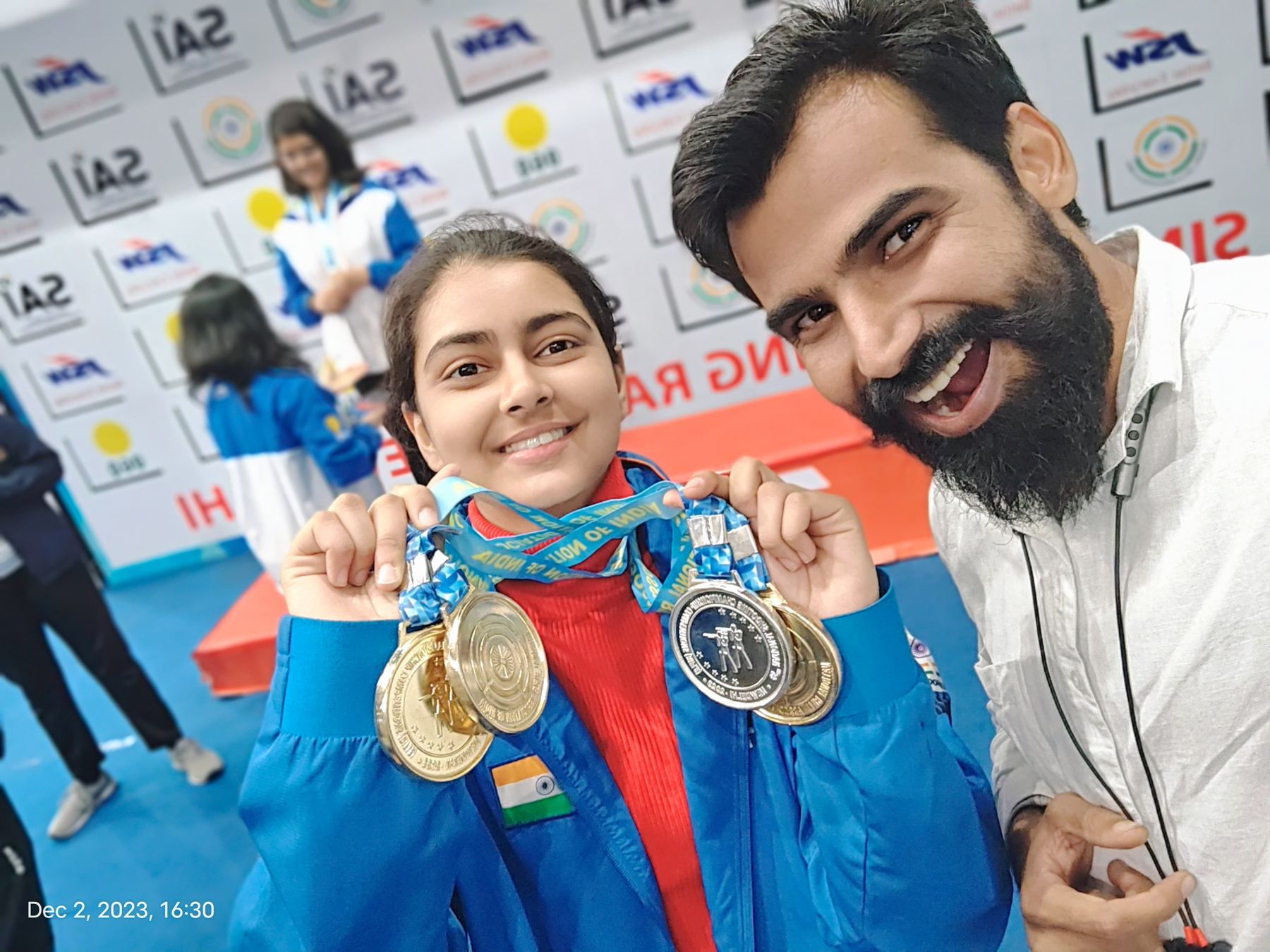 Trainee with championship medal